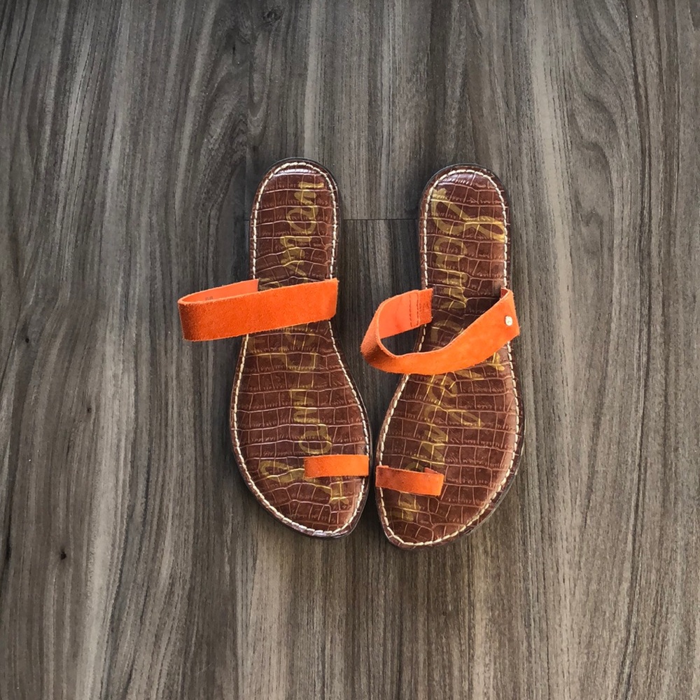 Orange sandals.